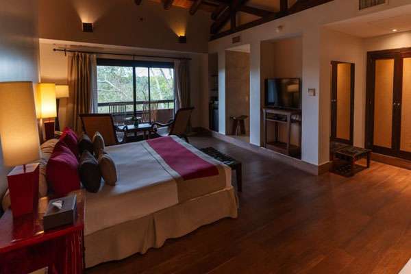 Relaxing by the poolside at Hotel Lois suites